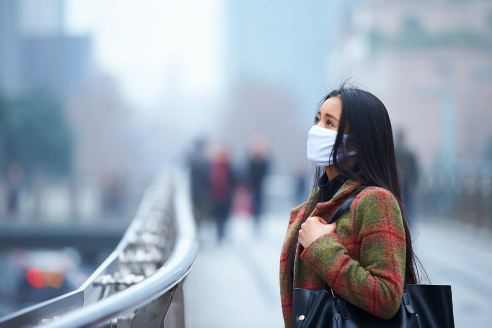 Woman experiencing skin pollution