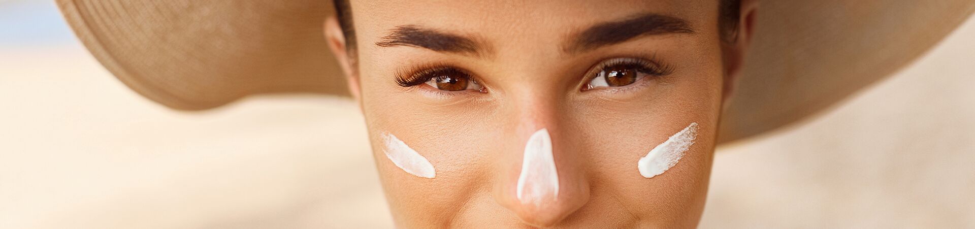 woman with moisturizer on face