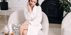 Woman applying skincare