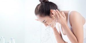 woman splashing water