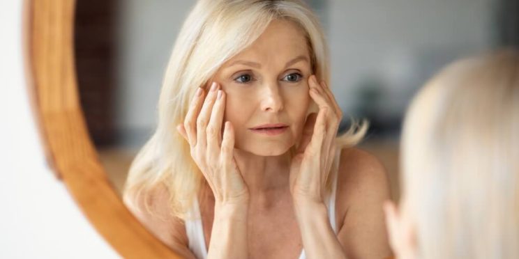 woman mirror skin