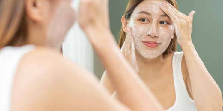 woman exfoliating