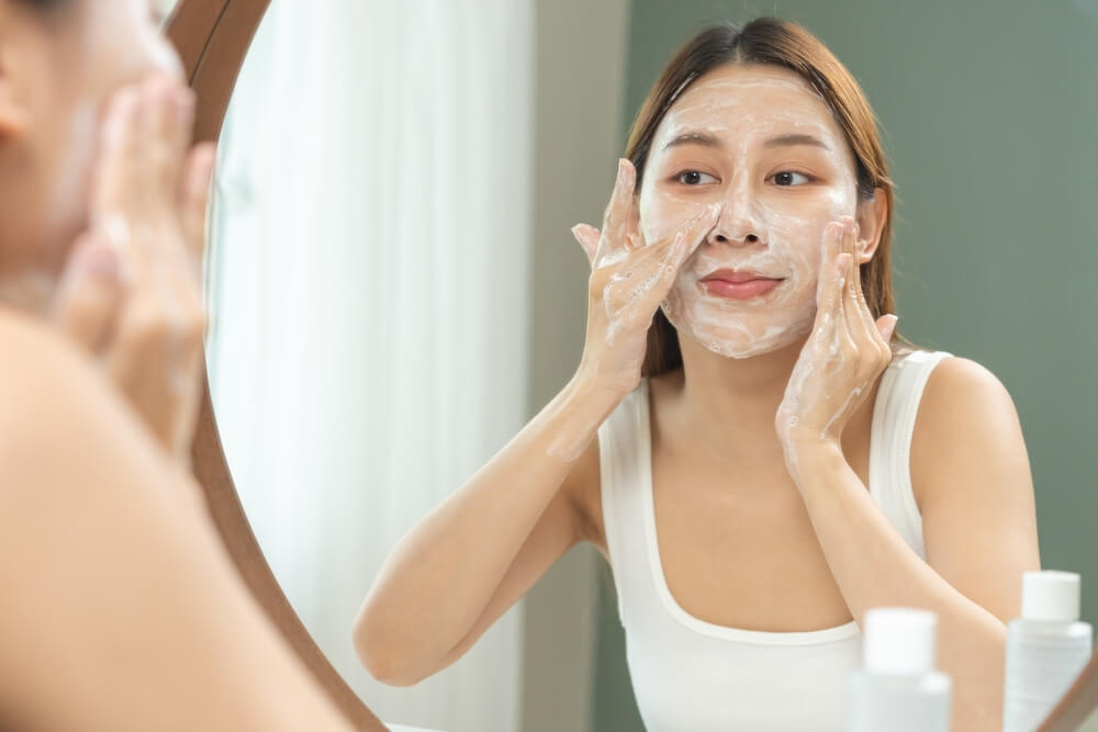 woman washing face